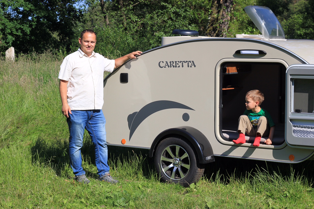 Caretta - small on the road, large on the campground – main image